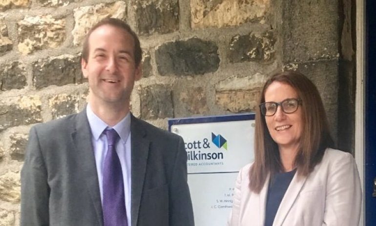 Scott & Williamson promotes two partners after 25 years’ service